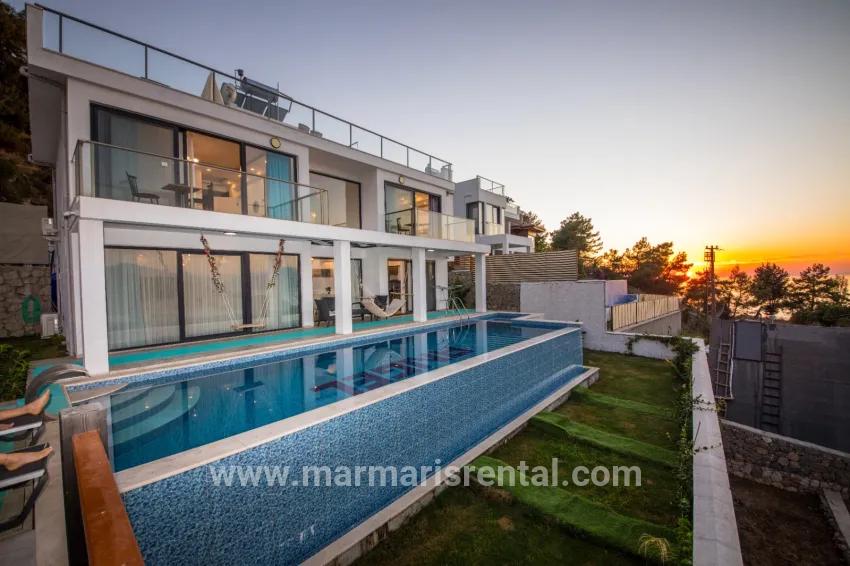 4+1-Zimmer Einfamilienhaus Zu verkaufen in Faralya Bz. Fethiye - 500 m²