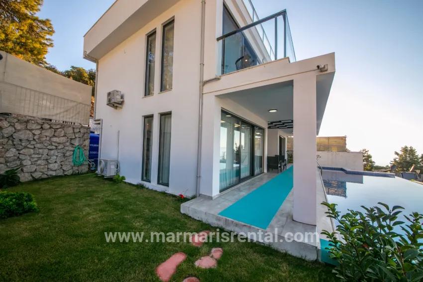 4+1-Zimmer Einfamilienhaus Zu verkaufen in Faralya Bz. Fethiye - 500 m²