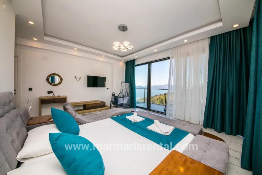 4+1-Zimmer Einfamilienhaus Zu verkaufen in Faralya Bz. Fethiye - 500 m²