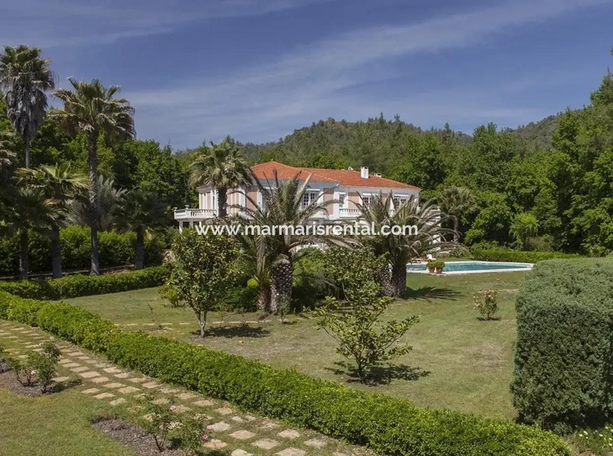 At A Distance Of 10 Km From The Centre Of Marmaris, Built With French Architecture Farm House Is For Sale.