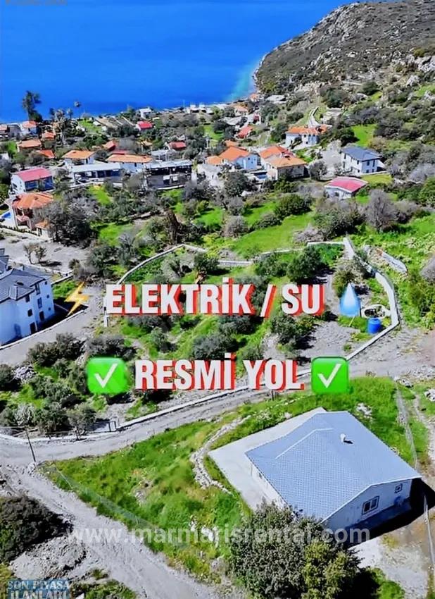 Söğüt köyünde Simi adası ve deniz manzaralı ekolojik turizm İmarlı 2100 m2 tarla