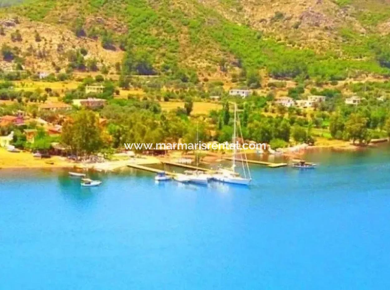 Marmaris Orhaniye Köyünde Denize Sıfır 3500M2 Turizm Yatırımı İçin Uygun Arsamız Satılıktır.
