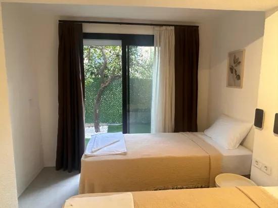 Marmaris Çıldır’da Denize 30 M Sıfır Lüks Bahçeli Eşyalı Kiralık 2+1